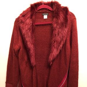 Burgundy sweater with faux fur and faux leather sleeves